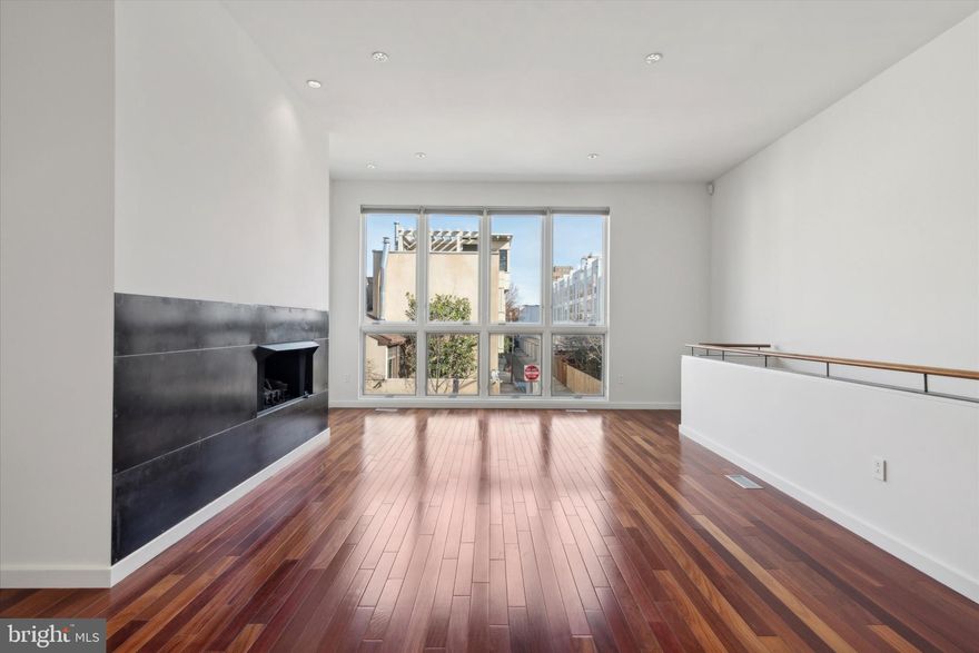 Welcome to this rare gem, a newly available 4-level townhouse in beautiful Fitler Square. 414 S 21st St is an amazing 20 ft wide property with attached 1-car garage parking, fully finished basement, elevator, and a large private patio. Located in Greenfield School Catchment it is the epitome of luxurious Center City living.

The first level of the house features a large kitchen with stainless steel appliances, double sinks, range hood, subzero refrigerator and stone countertops. This open concept flexible space can be used for a breakfast area, full dining space, or a living room with gas fireplace.  Brand new sliding doors lead out to an extra-large 600 sqft private garden. This floor also provides access to the garage, elevator access to all floors, a convenient half-bath and a spacious entry closet.

Heading up the stairs you’ll be flooded with light from a unique set of rooftop skylights. The second floor has an enormous open flexible space with gas fireplace, hardwood floors, and floor to ceiling windows. This floor gets amazing light! This space can be used as a large family room, open office space, or converted to another bedroom if desired. This floor also has the large primary suite. The primary suite has 5 total closets including two large walk in closets, and features a Juliet balcony overlooking the garden. The primary en-suite bath features double sinks, a soaking tub, and a separate stone-tiled shower.

Up on the third floor there are two spacious bedrooms each with their own en-suite baths and walk-in closets. There is also a large laundry room providing additional storage. This floor has the potential to add a built-in office.

Take the elevator down to your fully finished basement. This lower level features extra high ceilings, a full bathroom and a convenient kitchenette with refrigerator. This level also has a separate room that can be used as an office, craft room, or converted to an additional bedroom.

This centrally located home offers unparalleled flexibility and luxury in Center City West. Easy access to Rittenhouse Sq and the Schuykill River Trail. If needed, commuting is easy with quick access to 30th St station, or public transportation to CHOP and UPenn. Don’t miss this unique opportunity to own a modern and spacious one-of-a-kind property – offering the best of city living with the warmth of a family home.