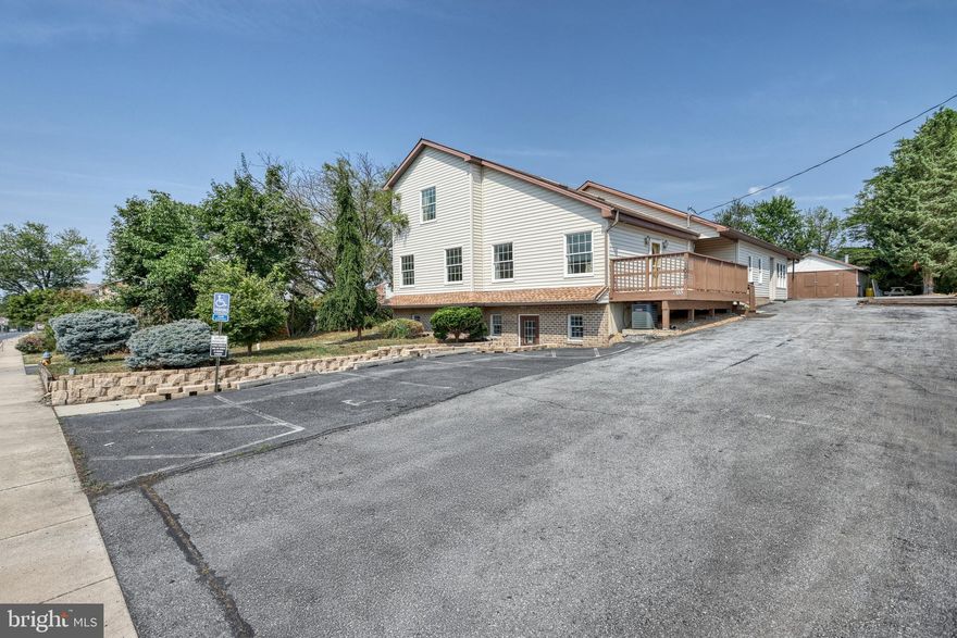 Multi-Use Property with Endless Potential “Live. Work. Play. All in One Place,
The main home offers 5 bedrooms and 3 baths, enhanced by a large modern addition featuring an extra bedroom, a loft, and a formal living room with soaring cathedral ceilings. The spacious  kitchen with center island,   wood cabinetry  and Second  modern kitchen ,  natural light is perfect for 2 family living and entertaining areas with extra 3 bedrooms in the basement
The lower level has own exit  designed for flexibility—currently set up with multiple offices, a reception area, a full kitchen, and a bathroom. a fully functional space for your business or professional needs,
Please verify acceptable use(s) with the zoning office
Updates for Peace of Mind New roof, New one of AC unit, Fully renovated interior