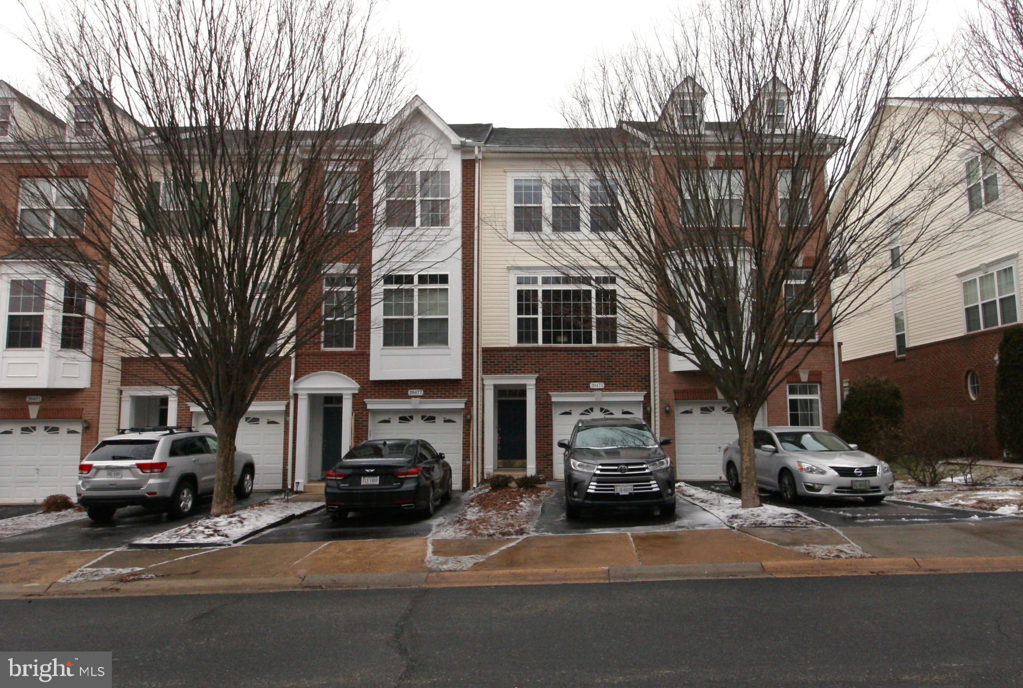 Move in into this 3 bedroom, 2.5 bathroom townhome in prime location. 2 bedrooms on upper level with laminate wood flooring opens to access bathroom. Vaulted ceilings in both bedrooms and walk in closets make for great use of space. Main living level has a large open family room, dining room and kitchen with lots of natural light throughout. Additional bedroom on lower level with laundry and access to garage. Outdoor space offers deck access from kitchen and patio under deck, offers great additional living space. Access to Belmont Country Club amenities with tenant paid membership. Home has been painted neutral grey. Ready for move in 9/5.