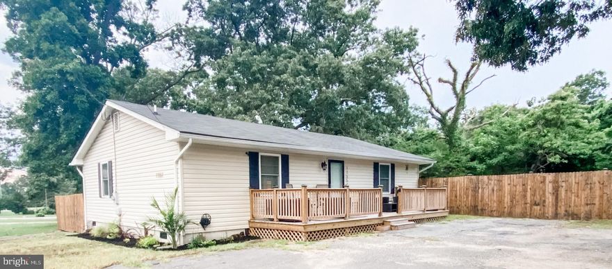 Welcome to this charming  3-bedroom, 2-bath rambler beautifully updated featuring an open concept layout. Situated on 1.28 acres with an expansive deck and  a large fenced-in yard, this home offers both space and privacy.  Enjoy modern amenities and convenience with its close proximity to restaurants, stores, and the charming Solomons Island. Loads of parking and no HOA,    Ideal for those seeking a blend of comfort, style, and easy access to local amenities, this property is sure to impress.