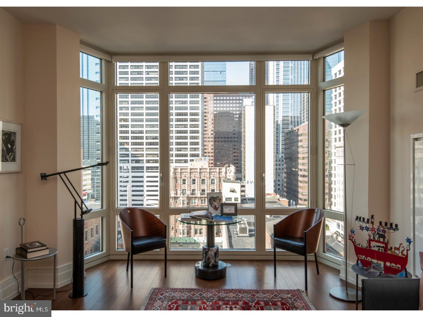 Experience the incomparable "10 Rittenhouse," offering unparalleled views, ultra-friendly staff, a warm and welcoming home for your furry "friends", an elegant lobby accented with ever-changing live floral masterpieces, private chauffeured transportation in an uber luxurious town car, and the best location in Philadelphia, right on the famed historic and vibrant Rittenhouse Square. This exceptional, very spacious (1,693 sf) 10th floor corner unit includes a coveted licensed parking space within the building (valued at $147,000 using a recent sale as the data point) and offers breathtaking, almost surreal cityscapes perpetually changing with the day and night skies. High-end finishes include burnished deep walnut floors, an "all-white" kitchen with lacquered cabinets, top-of-the-line stainless appliances and level 5 granite, luxurious bathrooms with frameless glass enclosures, high ceilings and an open floor plan. The current tax abatement and very reasonable condo fees (which include unlimited use of the indoor pool, gym, outdoor deck, social room, concierge and doormen) offer value combined with unparalleled luxury. Please note that this unit is the only 10 Rittenhouse unit currently on the market on a floor high enough to offer breathtaking unobstructed views because it is located above the surrounding low-rise buildings. Required disclosure: Listing agent is related to sellers.