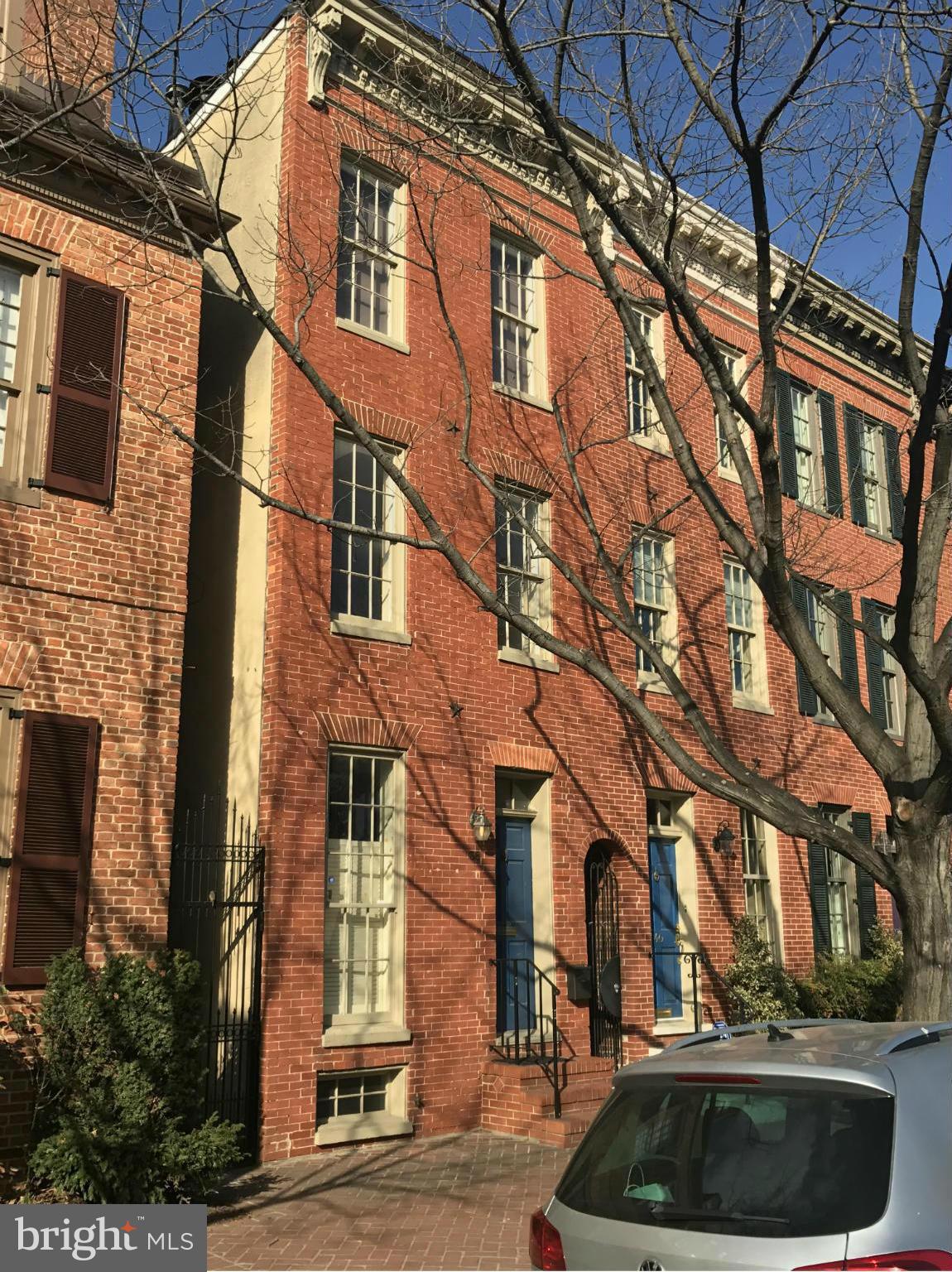 Historic Federal Hill, Rarely Available Brick Front Row Home Currently Set Up as Two Separate Units with Individual HVAC Systems and Meters! Live in One and Rent Out the Other! New kitchen with granite on 2nd level apt Washer and Dryers Uniquely Located & Close to Inner Harbor, Stadiums, Restaurants, Entertainment, See owner for Upgrades and operating expenses expenses