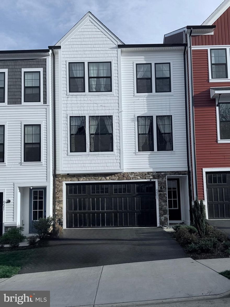 Spacious, Modern and Beautiful Townhouse built in 2020,  conveniently located for commute and walkable distance to Liberty Elementary is ready for a new tenant to start renting immediately. 

Step into a world of elegance and warmth with this stunning home, where engineered hardwood floors greet you throughout the main living areas, creating an inviting ambiance that immediately feels like home. Large windows, adorned with tasteful curtains, flood the space with natural light, enhancing the already open and airy layout. Imagine hosting friends in your modern kitchen, equipped with updated appliances and pull-out drawers that make cooking and entertaining a breeze. With spacious walk-in closet in primary bedroom, huge pantry in kitchen, you’ll find that storage is never an issue—perfect for the organized lifestyle you crave.

But that’s not all; step outside onto your expansive deck, where serene mornings and lively gatherings come to life in your spacious backyard, ideal for kids to play or pets to roam free. The finished lower level offers endless possibilities—set up a bar for entertaining, a home office for productivity, or a play area for the little ones. With a two-car garage featuring overhead storage, convenience is at your fingertips. And let’s not forget the smart features: a Nest Thermostat for energy efficiency and a smart lock for peace of mind.

Located just a stone's throw away from Liberty Elementary School and close to shops and amenities, this home is not just a dwelling; it’s a lifestyle waiting to be embraced. Don’t let this opportunity slip through your fingers! Homes like this are in high demand—act now and schedule your private tour today. Your dream home is just one call away!