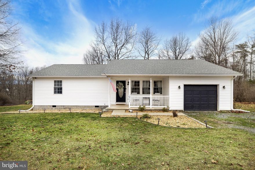 Nestled in the peaceful countryside of Martinsburg, WV, 512 Salvation Rd offers the perfect blend of rural serenity and modern convenience. This charming home boasts several recent upgrades, making it move-in ready for its next owner.  Step inside and you'll be greeted by a warm and inviting atmosphere, ideal for both relaxing and entertaining. The expansive yard offers plenty of space for outdoor activities, gardening, or simply enjoying the tranquil surroundings. This property promises the perfect setting for a laid-back, country lifestyle.  Enjoy fishing in the nearby pond or public creek access, both just a short distance away. Located just a short drive from downtown Martinsburg, you'll have convenient access to shopping, dining, and local attractions while still enjoying the privacy and beauty of rural living.  Don't miss out on this unique opportunity to own a well-maintained home with essential modern updates in a picturesque, no-HOA location!
**Key Features:**
- **Roof:** 3 years old..
- **New Well Pump:** Installed in September 2024.
- **Updated Bathroom:** Recently refreshed with modern touches for a stylish and functional space.
- **Fresh Paint:** Enjoy a bright and clean interior with fresh paint throughout.
- **Large Walk-In Closet:** Ample storage and convenience in the spacious walk-in closet.
- **Prime Location:** Just minutes from the VA Hospital and major commuter routes, ensuring easy access to both local amenities and the greater region.
- **No HOA:** Enjoy the freedom to personalize your property without the restrictions of a homeowners association (Road Maintenance Agreement Only).
-**Updated SS Appliances**
-**New Deck**