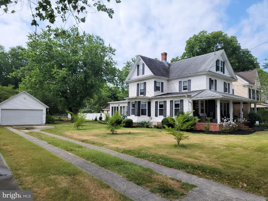 Snow Hill, established in the 17th century and serving as the county seat of Worcester County, is steeped in history. The town, laid out in 1686, is one of the oldest in Maryland. This colonial home at 205 W Martin St embodies the historical essence of Snow Hill while embracing modern comforts. 
 This well-maintained 3-bedroom, 2-bath colonial, nestled on over a third of an acre lot, is just a few blocks from the town center and local schools. Enter from the picturesque front porch into a generous living room that leads to a modern kitchen remodeled in 2021, with new stainless-steel appliances opens up to a spacious dining area, perfect for entertaining. The rear of the first floor features a sunroom, a laundry/mudroom, and a full bath, The rear door enters a beautifully landscaped garden terrace and oversized backyard. Upstairs features 3 bedrooms, a full bath, and a walk-up attic, providing ample storage or future living space. With curb appeal, custom moldings, gorgeous hardwood floors, and beautiful trim work, this home will not disappoint.
The property's traditional architectural style reflects the stately design and classic detailing characteristic of the region's historic buildings. The well-preserved architecture in Snow Hill offers a glimpse into the colonial and early American periods, with the town's historic district highlighting a variety of buildings from different eras.

For outdoor enthusiasts, the town of Snow Hill sits on the Pocomoke River. Byrd Park and Shad Landing are nearby. Byrd Park offers lush green spaces, playgrounds, and sports facilities perfect for outings and recreation. Shad Landing, part of the Pocomoke River State Park, is a haven for nature lovers, featuring camping sites, hiking trails, and opportunities for boating and fishing along the beautiful Pocomoke River. These attractions provide additional leisure options and enhance the appeal of living in this vibrant small town.
 Local beach destinations of Ocean City, Assateague Island and Chincoteague Island are only a short drive away.