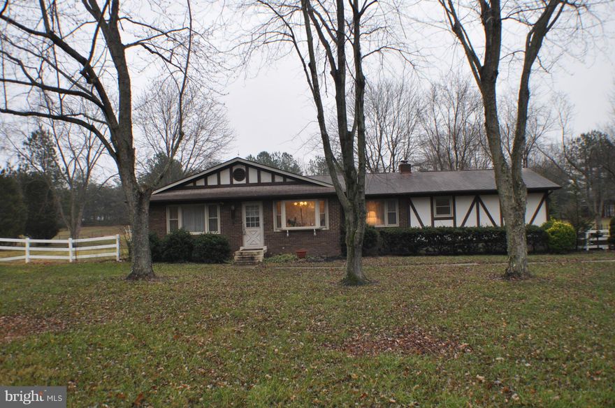 OPPORTUNITY -  QUICK! Back on market - buyer got cold feet!! WOW!  kitchen! Thermidor gas range+ dble wall ovens & HUGE Kitchen Aid refrig. - If you love to cook, you'll love this one!  Also,huge yard, great for summertime get togethers - room for everyone on this large level lot! Generous sized bedrooms, hrdwood floors, ceramic tile thru much of house. Great family room with cozy fireplace. AS IS