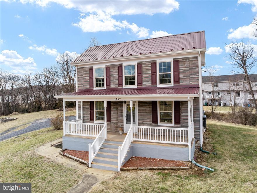 This is not your cookie-cutter new build — this home offers character you simply cannot replicate!

Welcome to this truly distinctive early 1900s folk-style home in the Town of Strasburg, VA — a property that beautifully blends timeless character with modern updates. Situated along Rt. 55 with convenient access to I-81 and downtown amenities, this home offers both accessibility and the ability to relax on the covered front porch while enjoying scenic mountain views.

Remodeled in late 2024, the majority of the home was taken down to the studs and rebuilt, with improvements throughout. Updates include 200-amp electrical service, new plumbing, new insulation, new windows, two brand-new heat pumps, and a new metal roof. The exterior preserves its historic charm with a mix of asphalt shingles and vinyl siding, maintaining the character of the original folk-home design.

Inside, you’ll find over 1,400 finished square feet filled with warmth and craftsmanship. Some original hardwood floors remain on the main level, complemented by deep windowsills, chair rail, and wainscoting accents that highlight the home’s historic personality.

The spacious kitchen and dining combo features striking white pine tongue-and-groove ceilings, creating a rustic yet refined gathering space. A convenient side-covered entrance leads directly into the kitchen, and the main-level laundry adds everyday practicality. The family room areas center around an original brick chimney, giving the space heart and architectural interest.

A flexible main-level bedroom offers versatility — ideal as a guest room, formal living room, dining room, or office.  And conveniently located close to a full bath with a walk-in shower. 

Upstairs, a classic wooden banister leads to three additional rooms, including two guest bedrooms and a third room (without a closet) perfect for an office, craft room, or playroom, or an optional 4th bedroom. A spacious full bath with tub/shower combo serves the upper level. Carpeted stairs and upper level add comfort, while the floored attic provides additional storage space. A cellar offers even more storage flexibility.

The generous .99-acre lot backs to trees and features expansive front, side, and rear yards. Outdoor highlights include:

Covered front porch with mountain views

Gravel driveway with large parking area and room to turn around

Concrete pad (ideal for a future outbuilding, patio, or basketball area)

Rear shed for storage

Space to potentially add a garage

Additional acreage available for purchase if desired

The septic system was repaired in 2026, offering added peace of mind. Town water and sewer hookup may also be an option.

If you’re looking for charm, space, mountain views, and convenience in Strasburg, this one is a must-see.