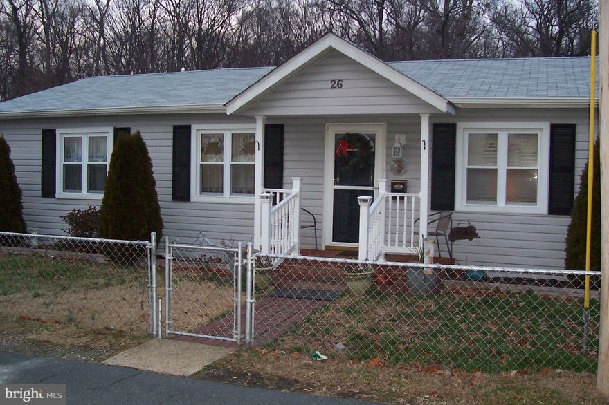 1500+ Sq. Ft. Detached   rambler in Potomac Heights.  Well maintained and move in ready. Small lot behind house conveys with this listing. Lot is privately owned by seller. House boasts 3 bedrooms with possible 4th being used as an office. One full bath with walk in tub and another half bath. Located on main street with parking directly in front (unassigned). Parking lot across from house also. Backs to woods for nice views from the back deck. Separate dining room off the kitchen. Priced to sell!! Any offers received will be presented on January 14, 2019