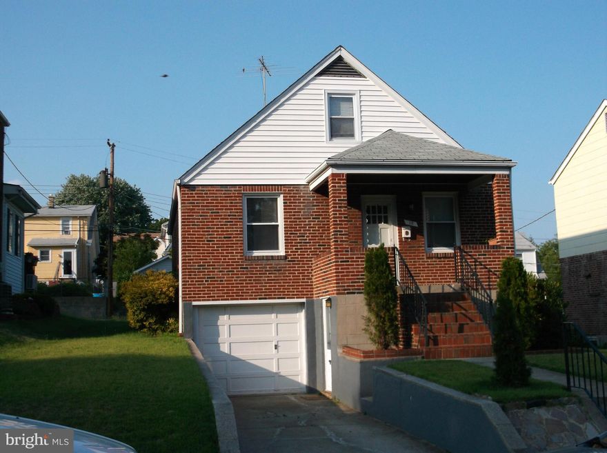 Charming, well maintained brick Cape cod with attached garage.  Large eat in kitchen.  4Bdrm/1Bath.  New carpeting and fresh paint.  Partially finished basement with front and rear entrance.  Spacious back yard! MOVE IN READY!  A real "MUST SEE" property.