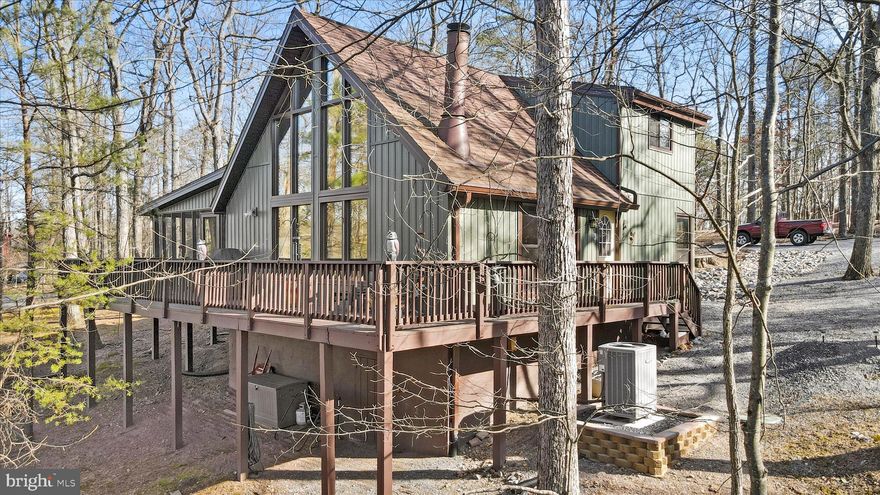 3BR / 2BA Elmwood Model | Wooded Setting | Class A Golf Membership Available

321 Clubhouse Ridge, Hedgesville, WV 25427

Beautifully maintained Elmwood model nestled in a peaceful wooded setting with Class A golf membership available. This 3-bedroom, 2-bath home offers numerous interior, exterior, and mechanical enhancements, making it truly move-in ready.

The kitchen features updated cabinetry and hardware, granite countertops, modern appliances, and backsplash. Both bathrooms have been renovated with updated vanities, countertops, fixtures, flooring, and new Toto toilets.

Major system features include a new heat pump, electric water heater, grinder pump, and radon mitigation system, providing comfort, efficiency, and peace of mind. The home also includes new Anderson windows (excluding window wall), Low-E cathedral windows, and window film for enhanced energy efficiency.

Exterior enhancements include new vinyl siding, soffits, fascia, gutters, gutter screens, preventative drainage, driveway stone, and recent tree removal—supporting low maintenance and strong curb appeal. Interior features include updated flooring throughout (no carpet), refreshed interior paint, ceiling fans, and enhanced lighting.

Ideal as a full-time residence, second home, or investment property, this well-maintained home combines privacy, comfort, and access to community amenities in a desirable setting.