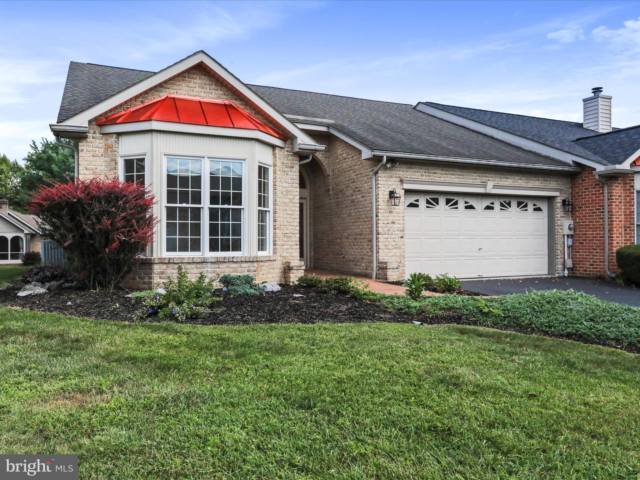 Welcome to easy, one level living at its absolute best! Located in the very sought after Spring Mills community, this spacious all brick, upscale end unit villa features a gorgeous ceramic tiled entrance way, two large bedrooms, two full bathrooms, a gourmet kitchen, separate dining room, formal living room, comfortable family room, and screened-in patio. The primary bedroom has a huge walk-in closet and private bathroom. The kitchen has plenty of cabinet and useable counter space. Cathedral ceilings make the home light and bright. The covered screened-in patio is perfect for relaxing during all seasons. Attached, oversized two car garage has pull-down attic stairs for plenty of storage space. The low cost HOA includes a jogging/walking path, picnic area, pool, tennis courts, and children's playground. Ideal commuter location within minutes to I-81 and the Maryland and Virginia state lines. Close proximity to shopping, restaurants, grocery stores and gas stations. Truly a must see and completely move in ready. Don't miss your opportunity. Schedule a showing today!