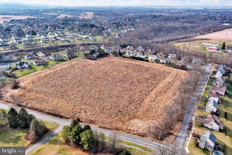 Take a look at this 5 star 13 acre property in Lower Macungie Township offering water, sewer and gas. Zoned Suburban allowing 12,000 sq. ft. lots. A rare opportunity to have an infill parcel come available offering all this plus walking access to a fantastic township park area complete with play areas, ball fields and meandering streams, 5 min. from the well ranked East Penn High School and across the street from a beautiful 55+ community creating endless walking trails in all directions, short drive to Emmaus to enjoy outdoor market in the warm weather and small retail businesses along the main street and downtown business triangle. The property is bordered by a tree line, has a gentle slope and the bonus of a metal building placed in a private corner of the parcel with 3 large garage doors. This incredible parcel is currently in tax saving covenant to minimize taxes. Buyer will be responsible for roll back consequences if the property is developed or covenant is breached. Full density development, family compound or large parcel home or other use, take a look today as it's not expected to last long.