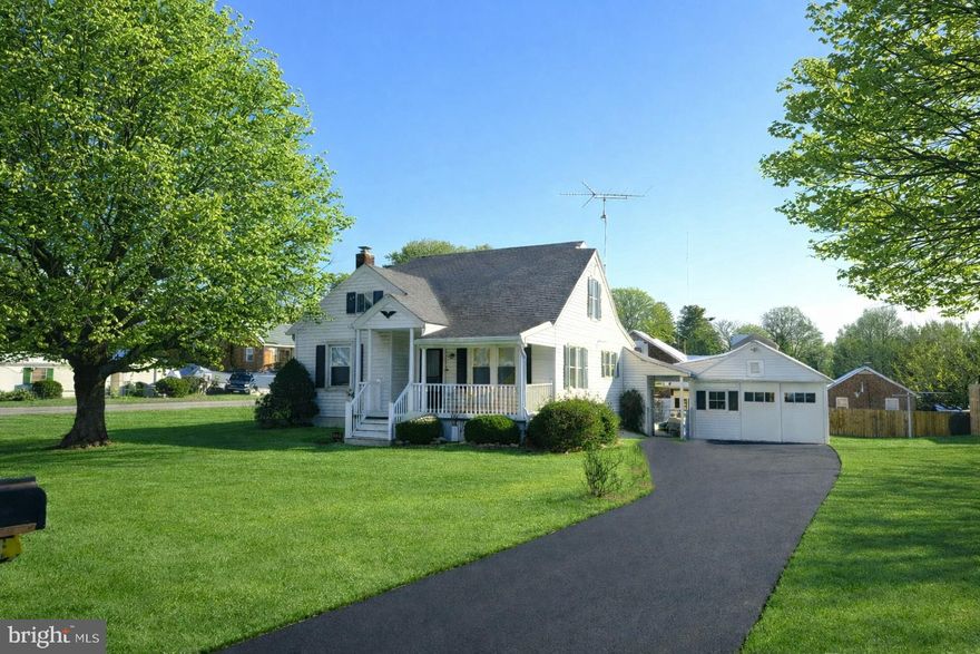 This meticulously maintained home at 355 S Camp St is ready for a fresh perspective. Commandingly situated on a prime corner lot, this property offers a bright, open presence and curb appeal that truly stands out in the heart of the Red Lion community. Owned by the same family for decades, the home serves as a rock-solid foundation for someone looking to infuse modern style into a classic layout.

The interior is defined by its substantial 1,770-square-foot footprint, featuring oversized rooms and a functional floor plan that maximizes natural light. The main living spaces with hardwood floors flow into a kitchen with ample workspace, while the lower level—complete with a family room and kitchenette—provides incredible versatility for an in-law suite or an expansive entertainment area.

The exterior features are equally impressive, anchored by an oversized detached garage with additional storage that offers endless possibilities for tradespeople, car collectors, or those in need of significant storage. In addition to the garage the driveway offers additional off-street parking. The covered patio and wrap-around yard space provided by the corner location makes for an inviting setting for family gatherings or a short walk from Red Lion Area schools and local parks. If you have been searching for a well-cared-for home with "good bones" and a prestigious lot position, this is your chance to shine.