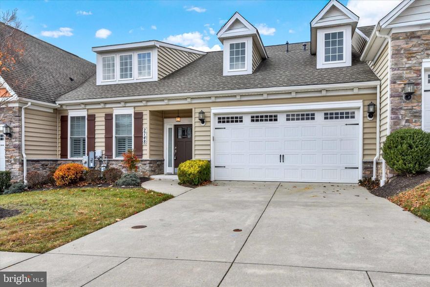 Castlefield 55+ Community in Manchester. Move in ready villa with 2 car attached garage. Step inside to discover a well-appointed interior that boasts three spacious bedrooms and two full and one-half bathrooms. The entry-level bedrooms provide convenience and accessibility, while the family room, seamlessly connected to the kitchen, creates an inviting space for gatherings. The kitchen features granite countertops, tile backsplash, stainless appliances, soft close cabinets, ample table space, perfect for casual dining or entertaining. The home is designed with comfort in mind, showcasing wood floors on main level and plush carpeting upper level. The primary suite includes a walk-in closet and primary bathroom equipped with a walk-in shower, ensuring a private retreat. A cozy gas fireplace adds warmth and ambiance to the living area, enhancing the overall charm of the home. Upper level with full bath and loft area.  Modern appliances, including a tankless water heater, electric oven/range, refrigerator, dishwasher, washer, and dryer, are included. The main floor laundry adds to the ease of living in this thoughtfully designed space. Outside, the property benefits from an attached front-entry garage and driveway parking, providing ample space for vehicles. The community amenities include well-maintained common grounds, with the association fee covering essential services such as lawn maintenance, snow removal, and water, allowing for a low-maintenance lifestyle. This property is not just a home; it's a lifestyle choice that emphasizes comfort, community, and convenience. Experience the perfect blend of modern living and timeless design in this exceptional home.