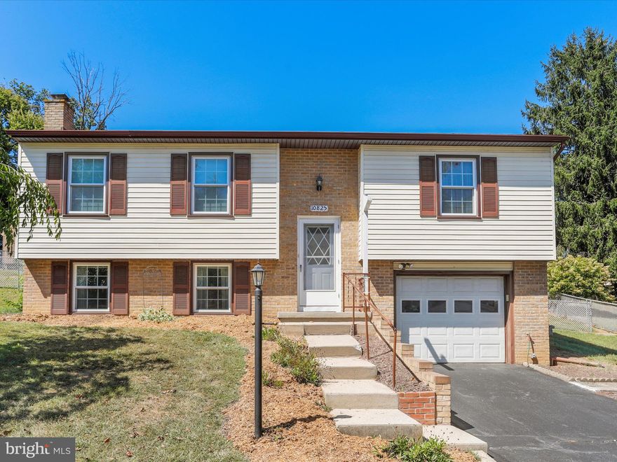 Beautifully-maintained split-foyer located on a quiet cul-de-sac.  The owners were meticulous about the care of this home and it shows!  Absolutely move-in ready, upstairs you'll find a great living space, kitchen/dining combo with loads of cabinetry and gas stove.  2 bedrooms and a full bath on the upper level include a huge primary bedroom with built-in cabinetry and double closets, space for a sitting area and  patio doors to the deck.  Newer sliding doors lead to the expansive deck and fully-fenced backyard, including a nice-sized shed situated on almost .25 acres.  The lower level provides an additional large living area complete with fireplace or room for an additional bedroom in the fully-finished basement.  Separate laundry room, oversized 1/2 bath with 2 vanities  and access to the attached garage finish the lower level.  All the important maintenance items have been replaced including a Trane HVAC system, newer roof and newer windows.  Featuring over 1700 square feet of living space, efficient natural gas heat and public water and sewer, you won't want to miss this one!  Single family living convenient to commuter routes and all that Washington County has to offer!