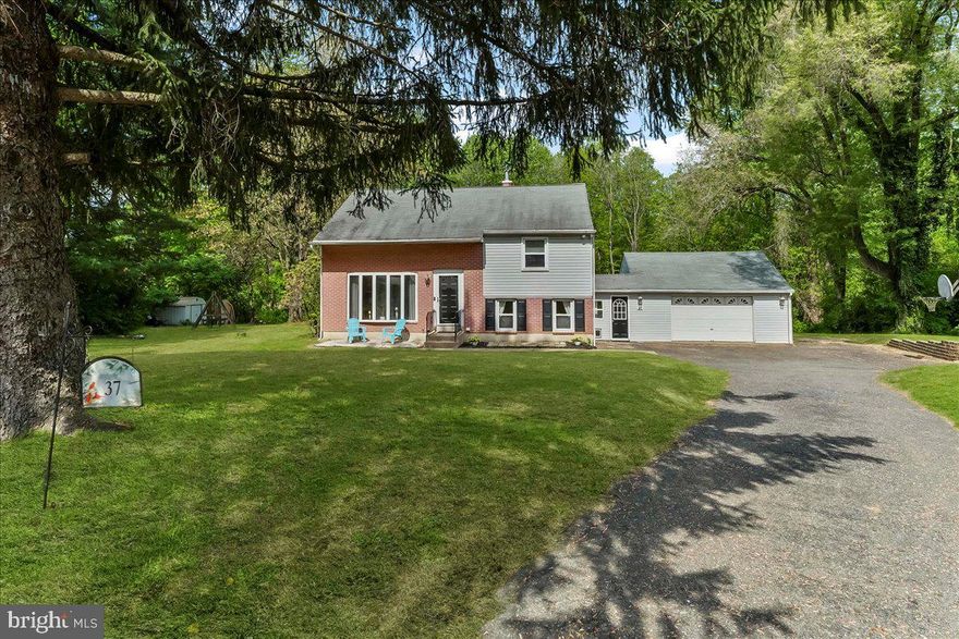 Fantastic one of a kind 5 bedroom, 2 bath home with an oversized 2 car garage and fabulous indoor and outdoor living spaces on a lovely 1.5 acre private lot at the end of the Bolling Circle Cul-De-Sac in the rolling hills of the Brandywine Valley and the sought after Garnet Valley school district; ideally located minutes from Delaware shopping, the Brandywine River, nature trails, Penn Woods Winery, Garnet Valley schools, parks, Brandywine Youth Clubs, Kicks dance studio, Garnet Valley Gymnastics, Darlington Arts Center, libraries, shopping, corporate centers, airports, Philadelphia, Wilmington, Media, West Chester and more. Only available as a result of downsizing, this exceptional home features great interior living spaces including a main level suite with its own private entrance that is accessible from the mudroom/garage featuring a great room with a stone fireplace, 2nd kitchen and dining area and a 5th bedroom that is perfect for an in-law, guest or nanny suite or just use as a master suite. The main living area includes  large living room  with a lovey bay window looking out over the front yard and warmly welcomes you home through the main front entrance, The main kitchen is adjacent to a dining room and the main living room. For added convenience there is a first floor laundry and full bath. The upper level features four more spacious bedrooms and a full bath. Most rooms contain original hardwood flooring under carpeting and can be exposed to suite buyer preferences. 
The outdoor space boasts a large deck overlooking the breathtaking 1.5 acre park like setting complete with an in-ground pool and there is a walking trail at the rear of the property that compliments a shallow meandering brook. This home is a must see to appreciate. Showings begin Friday May 2nd.  Open House scheduled for Saturday May 3rd from 12 PM to 4 PM !! Come see this fantastic home before its gone.