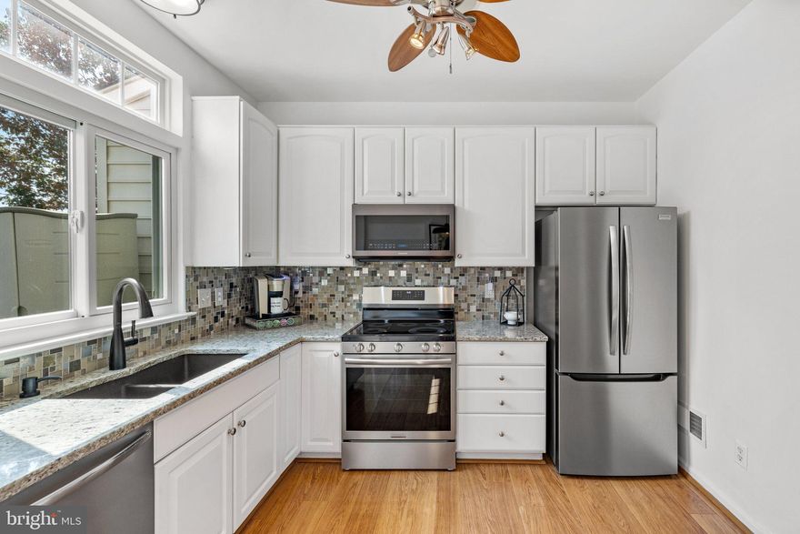 Welcome to your dream home in Ashburn Village! This exquisite 3-level townhouse offers the perfect blend of modern living and serene surroundings. With 2 bedrooms, 2.5 bathrooms, and a plethora of updates throughout, UPGRADED KITCHEN,  BRAND NEW APPLIANCE, SOUND SYSTEM throughout property, CUSTOM DESIGNED CLOSET, FENCED BACKYARD with gorgeous LAKE VIEWS, this home is a true gem waiting to be discovered.  Enjoy the privacy and luxury of two spacious primary suites, each with its own full bath, ideal for accommodating guests or multi-generational living. This exceptional townhome offers everything you need for modern, comfortable living in a beautiful and convenient location. Take advantage of the Ashburn Pavilion Sports Center, which offers a variety of recreational activities, fitness facilities, and social events. Located in a desirable neighborhood, you’ll enjoy easy access to shopping, dining, schools, and major commuter routes. Don’t miss the opportunity to make this stunning home your own!