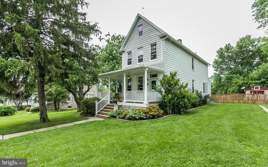 This beautifully updated home still nods to its original time period with stained glass windows, pocket doors, a huge kitchen, & large replacement windows.  You won't find an entertainer's delight like this, with a wrap around porch, double fenced in yard, TREX decking, wired garage & Offstreet parking for 4 vehicles.  You will fall in love with the open floor plan and  gorgeous hardwood floors.