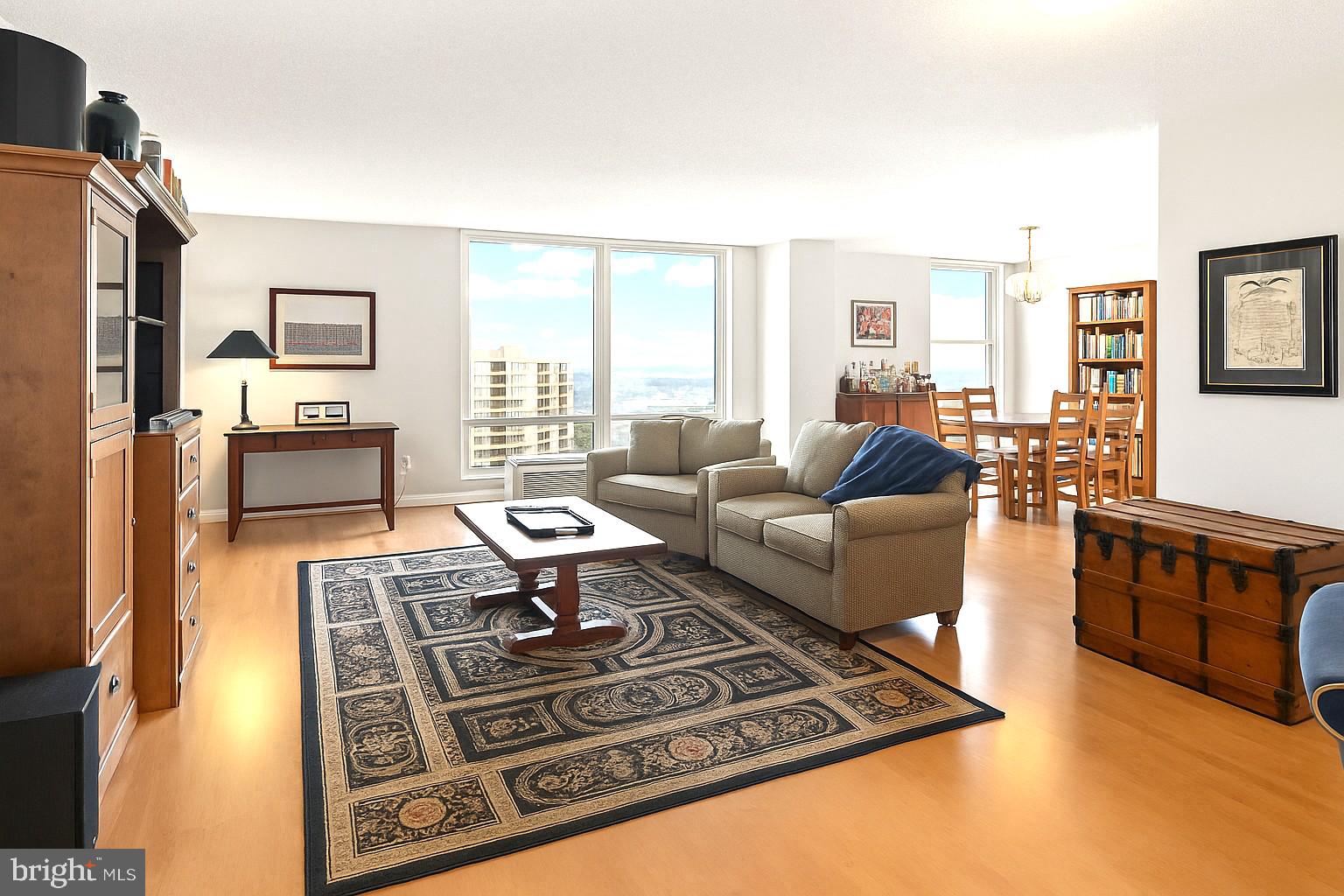 Step inside *The Ridgely*, Towson’s premier high-rise address, and discover effortless elegance in this beautifully appointed 6th-floor residence. A seamless open-concept living and dining space is framed by expansive windows, bathing the home in natural light and offering stylish comfort for both gatherings and daily living.
The spacious eat-in kitchen fits four and is thoughtfully equipped with abundant counter space, a generous pantry, and all the essentials like a stove, dishwasher, refrigerator, and disposal that’s ready to support your lifestyle from day one.
One of the standout features: **a full-sized in-unit washer and dryer**, offering the ultimate in convenience and privacy.
Unwind in the generous primary suite featuring a walk-in closet and an en-suite bath, offering a true retreat in the heart of bustling Towson. Slide open the glass doors to your **private balcony**, where tranquil views elevate your morning coffee or evening wind-down.
Residents of The Ridgely enjoy 24-hour concierge services, a refined lobby, on-site management, an elevator for effortless access, and a sparkling pool for summer relaxation. The building is designed with both accessibility and sophistication in mind.
Included with this home: a **covered, dedicated parking space** and a **secure storage unit**, adding practicality.