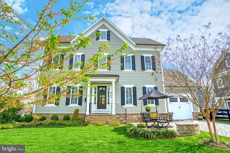 Fantastic new price -- get in just in time for 4th of July fireworks and neighborhood fun!!  This coastal colonial, a Charleston-inspired design and build by locally-based Evergreene Homes, is conveniently located in a fun neighborhood just a short distance from the Rosslyn/Ballston corridor. The 4 levels boast an efficient yet gracious floorplan with ample flex space between both a finished loft and lower level -- plenty of room for visiting family, home & work spaces to entertain and house an au pair or in-law!   There are 3 off-street parking spaces -- the generous paver driveway leads to the oversized one-car garage (great storage!) and allows for entrance into a tucked-away mud room... A perfect, out of the way drop-zone! Though modern construction and a semi-open floorplan, bygone charm abounds with wood floors on the main and one upper level, high ceilings and tall doorways and windows, 7â baseboards, 2-piece crown and chair rail molding and shadow boxing in the dining room. The gourmet kitchen boasts ceiling-height cabinets (42" plus another 21") with posh crown moldings and luxury glass door fronts -- the modern conveniences mean a huge Quartz center island, 36â wide counter-depth French door refrigerator and 6-burner gas cooktop along with ample recessed lighting. The exquisite living room offers a coffered ceiling and commanding fireplace flanked by built-in shelves and cabinets. The charming primary suite with a tray ceiling and fan, two walk-in closets and a luxurious bathroom with an elegant tub and separate frameless glass shower enclosure, a private WC, dual vanities and Timberlake cabinets make for a special retreat. The vast 4th level includes a loft area as well as a bedroom and full bathroom. The lower level hosts a 5th bedroom and dual entry full bathroom, as well as a recreation room, den (currently a home gym) and storage area. Outside, al fresco dining can be enjoyed from the recently added paver patio with knee wall and lovely surrounding landscaping all overlooking the most expansive, greenest, lushest lawn in the neighborhood!  The HOA offers the option to fence the front yard. There are two fantastic parks and a hiker / biker trail a stone's throw from the home and Metro is just a few blocks away. This is a very special and beautifully maintained home!