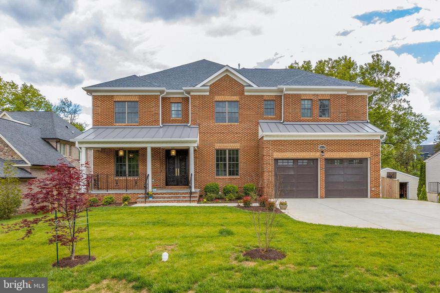 Enjoy an evening stroll to the heart of McLean and all that it offers including dining, shopping, coffee and entertainment. Strategically located just minutes from Tysons Corner, Washington DC, and more. Enter an extraordinary place you can call home with stunning and pristine finishes. No detail left unnoticed. This all brick craftsman estate welcomes you with a front porch worthy of relaxing on. Room after room of spacious domains, exquisite details found throughout; elegant trim-work and lighting accent world-class luxury. The foyer leads to the grand formal dining and living room. Executive's office beaming with natural light and built-ins. The light-filled great room opens to the Chef's kitchen with stunning counters and cabinets, stainless Thermador appliances, and morning room leading to the huge Trex decking. Relax in a sun drenched room where you can maintain the precise temperature you set with the electric wall mounted ductless air conditioning and heating unit. Upstairs features the luxurious master suite with tray ceilings, two walk-in closets, sitting area and more. Completely surround your body in a soothing cushion of heated massaging bubbles in the air bath. This bath delivers a blissfully warm, invigorating full-body massage experience. Four en-suites generously sized all with walk-in closets. The lower level is perfect for entertaining at the bar and the rest is where the possibilities are endless - a billiards room, exercise room, media room,  and more -you decide ! Plus an additional bedroom, rec room, bath and ample storage. In addition, there is an elevator shaft currently finished to be a closet space that can be easily transformed into an elevator transporting between the lower three levels. This Pristine home with four levels of finished elegance that will not disappoint.  Just minutes to Tysons, I495, I66 and Washington DC. In the heart of McLean yet tucked away in a quiet neighborhood beaming pride of ownership.