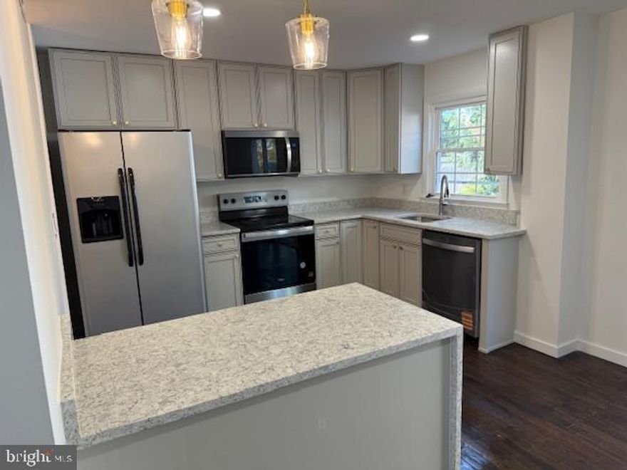 MINUTES TO METRO AND OLD TOWN! Lovely Updated Brick 4 Bedroom 2 1/2 Bath TH.  in moving condition, fireplace in the family room.  Minutes from Old Town Alexandria, Huntington Metro, GW Parkway, and just two blocks from public transportation, shops, and restaurants.