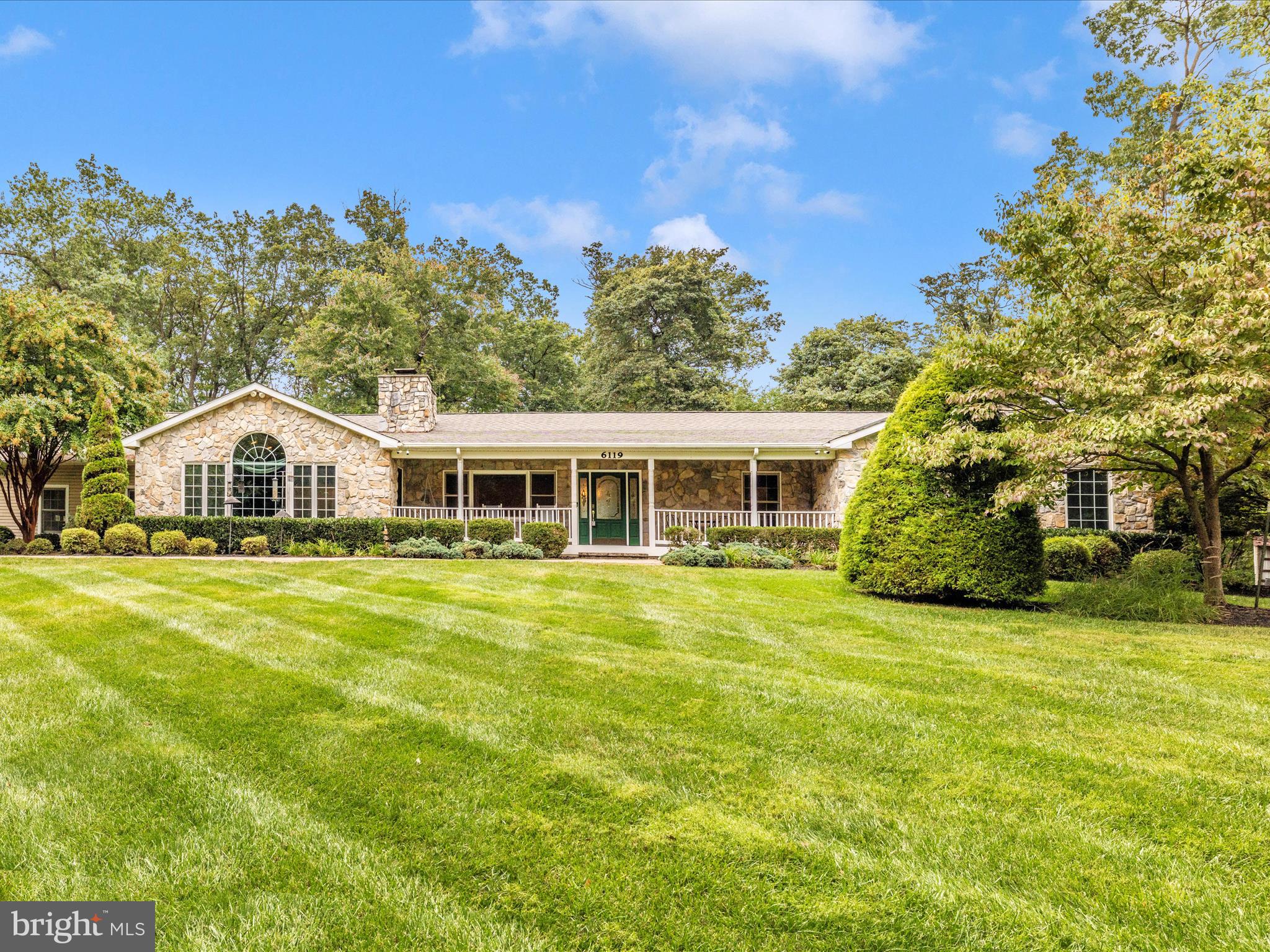 Nestled in a serene rural setting, this charming ranch-style home offers a perfect blend of comfort and craftsmanship. This amazing home has been updated and expanded, featuring a unique architectural design that invites warmth and relaxation. As you step inside, you are greeted by a spacious and inviting interior that boasts 2,540 square feet of finished living space. The traditional floor plan seamlessly connects the living areas, making it ideal for both entertaining and everyday living.
The family room, adorned with a cozy stone fireplace, serves as the heart of the home, while large windows and skylights fill the space with natural light, creating a bright and airy atmosphere. The kitchen is a culinary delight, featuring upgraded countertops, stainless steel appliances, and a generous island that doubles as a breakfast bar. With ample table space and a pantry, this kitchen is designed for both functionality and style.
This home includes four well-appointed bedrooms, including a primary suite with a walk-in closet and a luxurious en-suite bathroom featuring a beautiful walk-in shower. Additional interior highlights include recessed lighting and beautiful wood floors that add a touch of sophistication throughout.
A brand new architectural roof was just installed in June 2025, offering peace of mind and long-term durability for years to come.
Step outside to discover the expansive lot, spanning three acres of beautifully landscaped grounds. The outdoor space is a true oasis, featuring extensive hardscaping, a hot tub, and multiple patios and decks perfect for enjoying the scenic vistas of the surrounding trees and gardens. The property is partially wooded, providing a sense of privacy and tranquility, while the play area and secure storage outbuildings add to the functionality of the outdoor space.
Parking is a breeze with an attached three-car garage, a detached garage, and ample driveway space. The property is conveniently located on a no-thru street, ensuring a peaceful environment while still being accessible to nearby amenities.
This home is not just a place to live; it's a sanctuary that combines unique design elements with modern comforts, making it a perfect retreat for those seeking a blend of rural charm and contemporary living. Experience the warmth and comfort of this exceptional property, where every detail has been thoughtfully considered to create a true sense of home.
