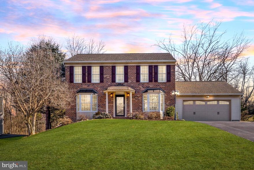 Offer Deadline Saturday, 3/1, at 6pm. Welcome to 4914 Rawcliffe Ct. This fantastic, 4-bedroom, 3.5 bath, brick Colonial is move-in ready, offered at an exceptional price and will not disappoint! Situated on an excellent lot at the end of a cul-de-sac, this home is truly a special find in Brampton Hills, one of the most sought-after communities in Ellicott City. Inside and out, you will find that almost every square inch of this home has been updated and meticulously maintained. Sophisticated features, recessed lighting, custom built-ins, cabinets and storage are found throughout the home, providing an optimal use of space. This stunning home boasts a large main level flooded with an abundance of natural light, creating an inviting and uplifting atmosphere from the moment you step inside. The expansive main level features a seamless flow from the foyer to the open-concept kitchen and family room, perfect for entertaining family and friends. The large gourmet kitchen is sleek and polished, boasting custom cabinetry, multiple islands adding extra prep space and storage, granites counters, tile backsplash and gas cooking. As a nod to the open space concept in this home, the kitchen is directly adjacent to a large family room addition with vaulted ceiling and wraparound windows. A set of glass French doors lead you directly off the family room to the expansive patio, perfect for grilling, entertaining or just relaxing with your favorite drink while taking in a fantastic view of the woods and nature. As you enter the formal dining room, you are enveloped in an atmosphere of sophistication and timeless elegance. This space truly embodies the art of fine dining, highlighted by exquisite custom woodworking and thoughtfully designed built ins. At its heart, a stately brick fireplace provides warmth and charm, offering a perfect setting for intimate gatherings and memorable occasions. The attention to detail in this room makes it a standout feature of the home, inviting you to entertain with grace and style. The main level office, with the addition of a pocket door, offers both privacy and an uninterrupted flow to the rest of the house. Whether you are working from home or pursuing personal projects, this space provides the perfect environment for focus and creativity. The mudroom is ideally placed with access from the garage and backyard, designed to help keep the home organized and clean with ample room for storing coats, bags and shoes. Ascend to the upper level, where you'll be greeted by gleaming hardwood flooring that stretches throughout. The expansive primary suite features a spacious attached bath and walk-in closet. The recently remodeled en suite bath is absolutely stunning and presents a large walk-in shower with floor-to-ceiling tile, bench, rainfall shower head and frameless glass door. The connecting room could be the perfect option for a nursery, home office or even converted to your dream closet. The expansive recreation room on the lower level is a versatile space tailored for entertainment and relaxation. With its generous proportions, this room provides endless possibilities for hosting gatherings, enjoying game nights, creating a home theater experience or exercise area. The gas stove can help keep the space feeling warm and cozy during even the coldest of winters. The bonus room and full bath can also provide a fantastic space for visiting guests. In addition to all of this, there is an incredible amount of storage space on this level that you simply need to see to believe. Outside, the level backyard is wide open, backs to woodlands and perfect for play or entertaining, and even features a hidden treehouse! This property is in an ideal location for shopping, restaurants, and commuting to both Baltimore and DC. Schedule your private tour today and envision your new beginning in this exceptional property.