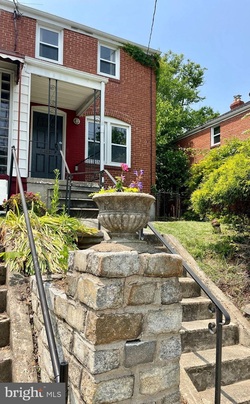 PRICE REDUCTION!!! 2 bedroom, 1 bathroom semi-detached brick home. This house sits up on hill providing a nice buffer between the house and the road. Freshly painted living room. Eat in kitchen with dishwasher.  Central AC.  Private back yard with 6 foot privacy fence and covered patio area. Perfect for outside dining or entertaining.  Ample street parking.  There is also a wide alley in the rear of the property than can be used for parking on certain days of the week.  
Location is close to shopping, schools and 695.