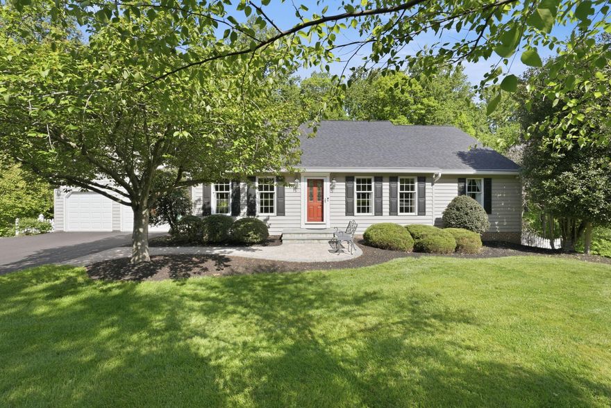 Enjoy one-level living in this stunning home with its open floor plan and the wrap-around deck overlooking the yard and the park beyond. Wood floors, an updated gourmet kitchen, the private primary suite with walk-in shower in the luxury bath, and main level mudroom/laundry are just some of the features that make daily living easy, and entertaining a dream!