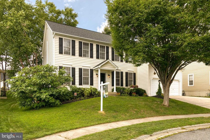 Welcome to 9920 Snowy Hill Terrace situated on a quiet cul-de-sac in the highly sought after community of Emerson in North Laurel, Howard County (top ranked schools!)! This home features fresh paint and carpet throughout and will be sure to impress! As you enter, you’ll find a private office space complete with built-in shelves, perfect for working from home. The formal living room and dining room are graced with beautiful trim work and flow nicely into the kitchen. The expansive kitchen with flowing hardwoods and a generous-sized island (with breakfast bar) features 42” dark maple cabinets, abundant granite counter space, plus a new stainless steel refrigerator and dishwasher. The large family room off the kitchen is perfect for friends and family to gather while you entertain, complete with a cozy ambiance from the fireplace. Just outside, enjoy the stunning, expansive, composite screened-in porch, which offers 3 ceiling fans and overlooks the nicely sized rear yard that is mostly fenced. Upstairs you’ll find your primary bedroom with both an ensuite bath complete with updated fixtures, as well as two large walk-in closets. 3 more bedrooms with large closets are featured upstairs with another full bathroom to share. In the recently finished basement, you’ll find even more livable space and another full bathroom. Basement features natural light with windowed french doors and walk up stairs to your backyard! Updates include both furnaces in 2018  (2-zones in this home!), new roof 2019,  as well as a new hot water heater. Laundry is currently set up in the basement but could be moved to the mudroom off the garage, where there is also a hook up. Enjoy all the community amenities Emerson has to offer like the community clubhouse with private meeting room, community pool with water park, tennis courts, tot lots, paved walking trails, dog parks, and more! Situated just minutes from shops and restaurants, including Maple Lawn shopping, as well as quick and easy access to major commuting routes (29, 95, 32, 295, etc!). This opportunity is too good to pass up!