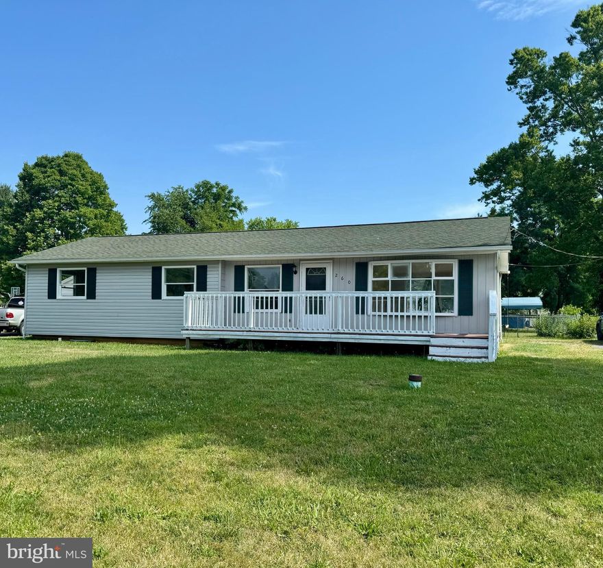 Stop the car and look inside!  Affordable, Adorable and Available for you to call home!   This recently renovated 3BR/1 BA rancher located along a country road with nearly a half acre to play can be yours.   This classic home has beautifully renovated from top to bottom. The kitchen with new everything will check all of your boxes.  From floor to ceiling, no portion of the house has been spared the beautiful updates.   The kitchen is open to living room providing the desirable open floor plan many ranchers do not have.  The white backsplash against the granite counters and stylish (and waterproof) LVP flooring makes this a spectacular place to entertain, eat and enjoy! Pristine new white cabinets are plentiful with extra space for an island if you wish!  The three bedrooms are all very spacious with ample closet space.   The hardwood floors throughout the house are in amazing condition and you will certainly be impressed!  The full bathroom has been remodeled with a double vanity with drawer storage,  tile work, new flooring and well appointed fixtures! 
The large composite back deck will make for amazing yard parties and the front deck boasts a pretty view to have morning coffee and listen to songbirds. The full basement is home to many opportunities!  Currently hosting the laundry space, the massive basement is prime for many uses.   This is one level living with the benefit of storage and additional space. 
All new appliances, hot water heater, new paint throughout,  no HOA, Shingled roof is less than two years old, ...and the list goes on!  Do not miss this opportunity to own your slice of Almost Heaven, call for your tour today!