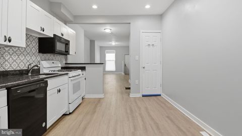 Townhouse For Sale - 713 N Belnord Avenue<br/> BALTIMORE, MD 21205