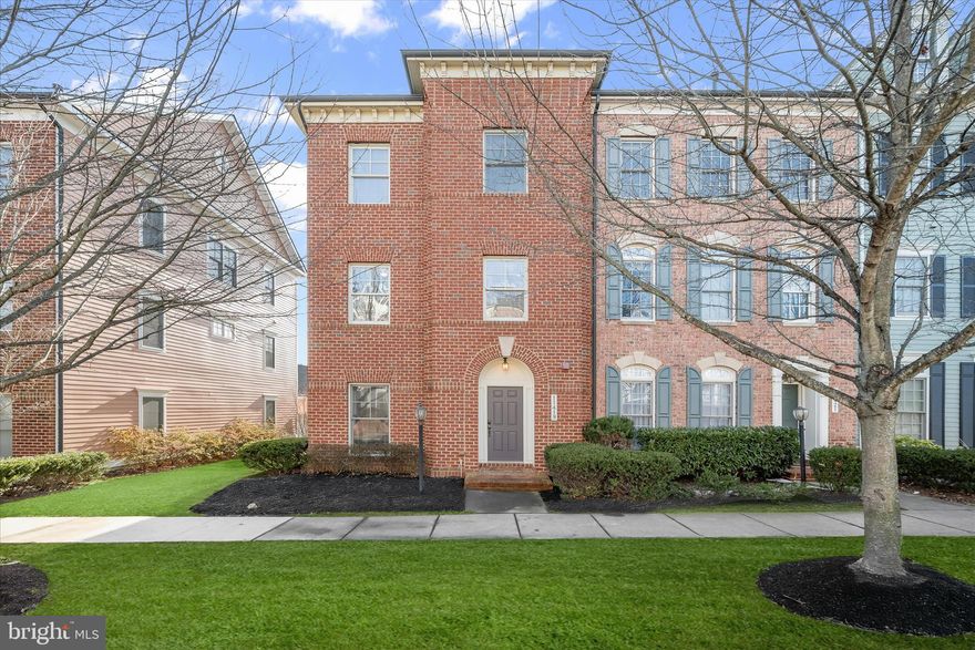 Welcome home to 11419 Iager Boulevard in Howard County’s most sought-after neighborhood - Maple Lawn! This end-of-group brick front townhome built by luxury home builder Miller & Smith exudes curb appeal and is located in the Midtown district just steps from Maple Lawn’s renowned community center, pool, and gym. This property features the popular floor plan with main living & dining areas on the first floor as well as a dual zone HVAC system. The first level presents a stately formal dining room with crown moulding, a spacious kitchen with breakfast nook, and a living room at the rear. The kitchen boasts a large island, granite countertops, 42’ oak cabinetry, double ovens, stainless steel appliances, a mosaic tile backsplash, and a breakfast bar for additional seating. The living room is equipped with an inviting gas fireplace and a wall of windows allowing an abundance of natural light. The living room also leads to the courtyard and TREX deck, perfect for outdoor entertaining. Beautiful hardwood flooring is found throughout Level 1. 

Your private primary bedroom suite awaits on Level 2 showcasing a stunning and completely renovated primary bathroom. Tastefully finished with dual vanities, updated light fixtures, and beautiful tile work, the primary bath leads to a generously sized walk-in closet. Luxury vinyl plank flooring is found throughout this level. Additionally, Level 2 includes a private office and a conveniently located laundry room and hallway linen closet. Discover more luxury vinyl plank flooring on Level 3. This top level loft area features a bonus flex space perfect for a play room or theater room with a soaring vaulted cathedral ceiling and recessed lighting. Two more spacious bedrooms and a shared bathroom with dual sink vanity are also found on Level 3. Conveniently located close to all major Baltimore/DC commuter routes, and with enviable amenities including a resort-style community pool, tennis courts, pickleball courts, basketball courts, state-of-the-art gym and more, you’ll quickly see why Maple Lawn is an award winning planned community unlike any other in the area. And parking will never be a problem with your two-car detached garage. This home is quintessentially Maple Lawn and completely move-in ready. Don’t let it slip away!