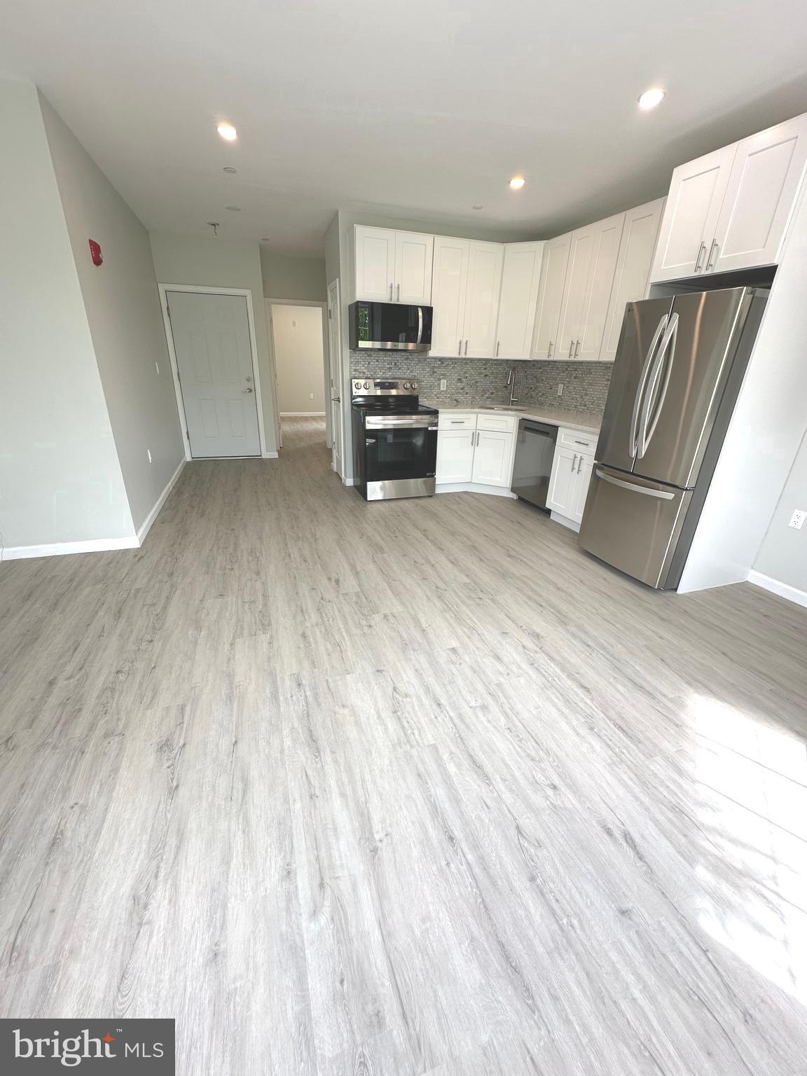 Experience modern city living in this beautifully and fully renovated 1 bedroom, 1 bathroom apartment, located in the heart of historic Germantown. This bright and spacious apartment features large windows that allows an abundance of natural light and overlooks the beautiful Wyck Historic House and Garden , a national landmark. The fully updated kitchen with pantry is a standout, complete with stainless steel appliances, quartz countertops with a marble backsplash, and contemporary cabinetry - perfect for anyone who enjoys cooking and entertaining. The bedroom is well proportioned with generous closet space. The modern bathroom is sleek and functional. The apartment is heated and cooled using two brand new and highly efficient mini split HVAC systems. Feel the warmth in the winter and the icy chill in the summer. Fully renovated and brand-new apartments like this do not come along often. Take advantage of the opportunity to live in this prime Germantown Avenue location.