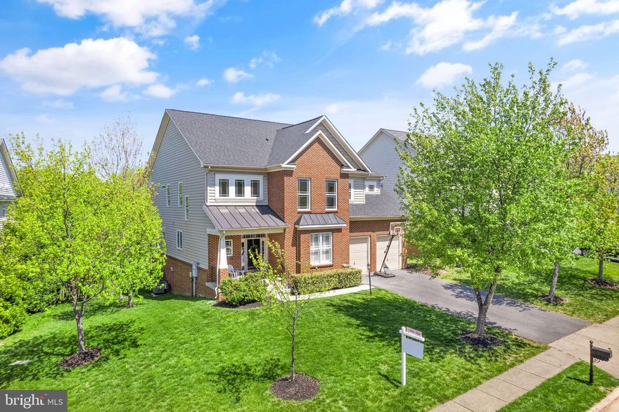OPEN HOUSES CANCELLED, HOME UNDER CONTRACT, MULTIPLE OFFERS RECEIVED!

 Simply gorgeous and immaculate brick front, single family home on a cul-de-sac in Brambleton!  On 0.27 acres of land, this 5 bedroom, 4.5 bath home with 2 car garage, has 5450 square feet of finished space (3723 above ground finished sqft and around 1726 finished sqft in basement).  There are plenty of ways to enjoy and relish in the outdoors whether it be from your walkout basement that takes you to the beautiful fenced-in backyard, deck, balcony off the office, or the front porch!  

MAJOR KITCHEN AND MAIN LEVEL RENOVATION completed in 2016:  modern and elegant kitchen with extended white cabinets and glass cabinets that go all the way to the top, plenty of cabinet/storage space, huge quartz island, quartz counters, backsplash, ceramic apron sink, stainless steel appliances including an amazing stove/range, and beautiful modern pendants above the island.  Mudroom, mantle with built-ins, and entire home was also painted in 2016. 

The open concept kitchen flows right into the expansive, airy and high ceilings of the 2 story family room, where everyone can gather around the fireplace.  Completing this exquisite main level is the elegant formal dining room, living room, study, and access to the balcony and deck.  There are two sets of stairs (one oak and one carpeted) for added convenience leading to the upper level!

The upper bedroom level houses 4 bedrooms and showcases a tray ceiling in the primary bedroom, newly renovated primary bathroom with standalone tub, frameless shower and upgraded shower tiles, beautiful herringbone design marble floors, and marble vanity!  This level also has an ensuite and jack & jill bathroom.

The lower level basement has just recently been completed with new LVP floors throughout, a legal bedroom and full bath, along with 2 extra rooms to utilize how you wish (a gym, game room, or office)!   Access the huge backyard in this walk-out basement!  

SO MANY RECENT UPDATES:  newly finished basement (2024), newly renovated primary bathroom (2023), new roof (as of 2019), both outdoor AC units replaced (2022), new water heater replaced last year (2023).  

Brambleton HOA includes free cable and internet as part of your HOA dues!  In addition, Brambleton is an amazing community that has tons of amenities including 4 community pools, a multitude of playgrounds, volleyball court, tennis courts, basketball courts, Legacy Park, and Brambleton Town Center that boasts Brambleton Library, the movie theatre, grocery store, shops, stores, and restaurants!  Great location near Dulles Greenway and Dulles International Airport making traveling super convenient!  This one is a true gem – don’t miss out!