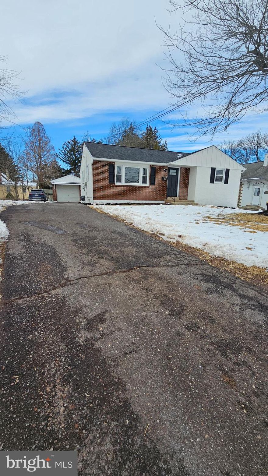 Ranch-style by design, this home offers the ease and comfort of true one-floor living. The main level features a modern kitchen highlighted by a large island providing additional counter space, seamlessly opening to a spacious combined living and dining room. Beautiful hardwood flooring, stylish light fixtures, and a neutral décor create a bright and inviting atmosphere throughout. The first floor also offers three generously sized bedrooms and a three-piece hall bathroom featuring a custom-made shower, elegant vanity, and ceramic tile work.

The lower level is fully finished and ideal for extended living or an in-law suite, offering a large living/family room, kitchenette, spacious bedroom, and a modern three-piece full bathroom, along with direct access to the rear patio. Additional highlights include central air and central heat, newer electrical system, newer roof, and a large covered rear patio overlooking a spacious backyard. Completing the property is a detached one-car garage with windows, side entry door, and overhead door for vehicle access.