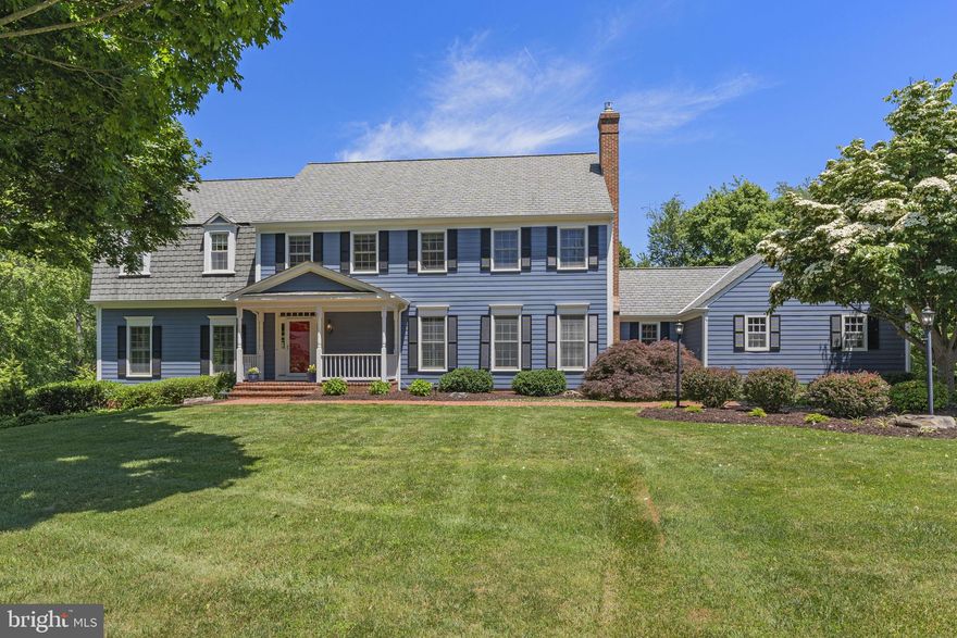 This impressive and meticulously maintained home on a manicured 2 acre lot in the distinguished Haddonfield Community offers over 5,500 square feet of elegant living space with an outside oasis of decks, patios and porches overlooking the breathtaking swimming pool and beautiful sunsets. As soon as you step into the foyer you are captivated by the charm and beauty of this home, with the high ceilings, designer details and gleaming hardwood floors. The walls of windows bring the outside in and fill every room with natural light. The main level is spacious, yet comfortable with a gourmet kitchen featuring a large center island, upgraded appliances, a butlers pantry and a huge sunlight breakfast room overlooking the grounds with glass doors leading to the back deck. The charming family room, separate formal dining room and step down elegant living room with triple French doors opening to the covered back porch are the perfect spots for entertaining. The main level is complete with a private study and a large mud room directly off of the 3 car garage. The elegant Owners' Suite is a room you will never want to leave featuring a renovated spa bathroom and a private upper 4-season sunroom with breathtaking views of the treetops and sunsets. There are three additional bedrooms and one remodeled full bathroom upstairs. The walkout lower level includes a second full kitchen, a full bathroom, a gym, a large rec room, a second washer/dryer and a sitting room opening to a covered patio. Outside will feel like a private retreat with breathtaking grounds complete with extensive landscaping and hardscaping, a large swimming pool (2008) with a summer auto-cover, a new trex deck (2020) and multiple patios and porches. Complete with 3 fireplaces, a 500 gallon propane heater, a 100 year roof (2006), replaced HVAC units (2014), replaced Anderson renewal windows (2006), and much more. This is truly a must see!