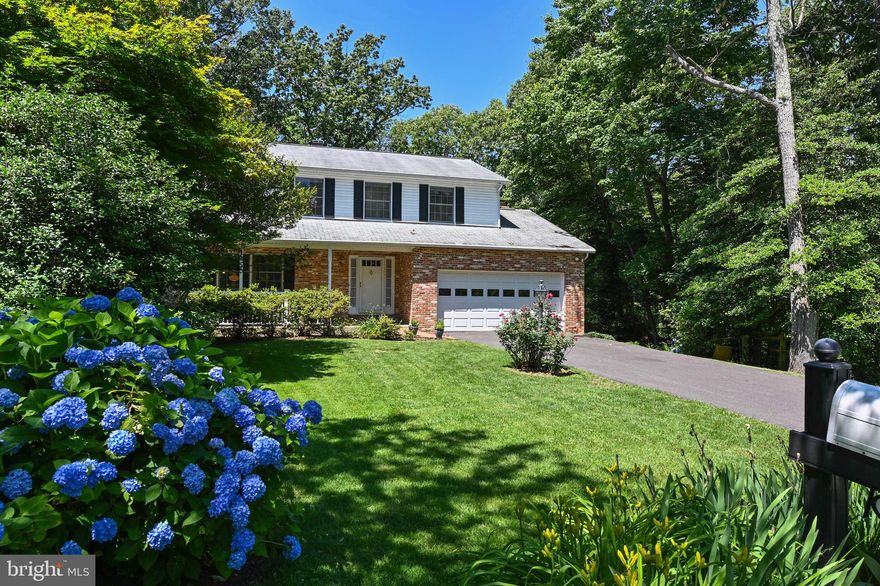 Lovely end of cul-de-sac location just minutes from Historic Downtown Annapolis and all major commuter routes.  Large home with huge first floor owner's suite addition, including vaulted ceilings and luxurious en suite bath.  Backs to woods for total privacy.  Nice sunroom on back overlooking beautiful in-ground pool.  Great price for large home close in to Annapolis!