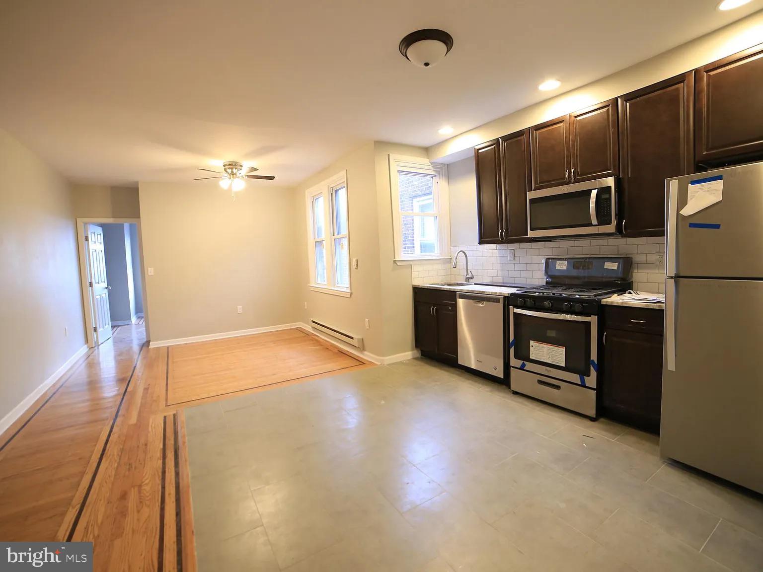 Don’t miss this well-maintained and spacious 2-bedroom unit located on the 2nd floor of a duplex in the quiet, residential Wynnefield neighborhood. Enjoy original hardwood floors throughout, complemented by stylish tile in the kitchen and bathroom. The open-concept layout connects the living room and kitchen/dining area, offering an abundance of natural light from numerous windows.
The kitchen is equipped with granite countertops, stainless-steel appliances including a dishwasher, fridge, microwave, and gas range. The bathroom features a skylight and an in-unit washer and dryer for added convenience.
Location Highlights
• Easy street parking in a peaceful neighborhood
• Steps from bus routes 40 and 52, Cynwyd Line, Paoli/Thorndale Line, and trolley 10
• Close to Fairmount Park, City Ave, St. Joseph's University, and PCOM
• Convenient access to Manayunk, East Falls, University City, West Philly, and Center City
Additional Info
• Pets allowed with landlord approval and references (non-refundable $350 pet fee)
• Tenant responsible for all utilities
Minimum requirements:
-Total income 3x rent
-Credit Score 650 or higher
-No eviction or criminal record
-First/last/security deposit available
