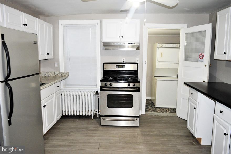 2nd Floor apartment only (Top level with separate entrance).

Nice size 2 bedroom/ 1 bath. The second bedroom has a huge closet. The family room has extra storage space. Off of the kitchen is an outcove with a desk for your office needs. There's even a washer and dryer! Plenty of natural sunlight! Super quiet neighborhood and minutes from Social Security Administration, shopping mall, outlets, restaurants, and more!

Water included in rent!