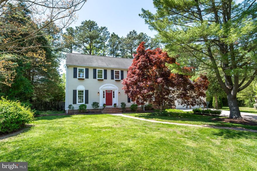 Great location in town  of Easton , south of Idlewild Park in the lovely and tucked away neighborhood of Pennsfield.  Handsome center hall colonial offering bright and sunny interior spaces and a nicely landscaped yard with mature plantings. First floor center hall connects living, dining and kitchen which then leads to a cozy family room with fireplace and adjacent screened three season porch all overlooking the private backyard, up the stairs brings you to four generous sized bedrooms, a hall bath and a charming primary suite with  wood burning fireplace. All of the bathrooms have been remodeled and are bright and fresh. Full, dry basement for projects and storage with interior steps and walk out along with a generous two car, two door garage with shop space and back yard access.