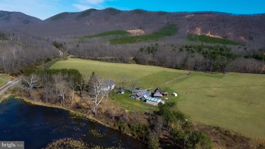Rare opportunity to own 790 acres across four contiguous parcels in scenic Bath County, centered around a historic 1914 farmhouse on a 53-acre parcel. Zoned A-2 Agricultural, this expansive property is well suited for agriculture, recreation, conservation, or a private legacy estate.
The main residence offers 3,496 sq ft of living space with 5 bedrooms and 2 full baths, featuring classic farmhouse character and generous room sizes. Set amid rolling land and mountain views, the property provides exceptional privacy and scale while remaining accessible to the Millboro area and surrounding communities.
This offering combines historic charm, substantial acreage, and long-term land value—an increasingly rare find in today’s market. Shown by appointment only. Please do not drive by the property.