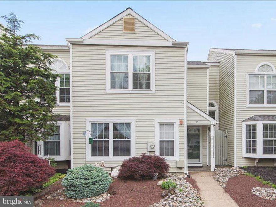 Discover easy living in desirable Tyler Walk! This move-in ready 2-bedroom, 1.5-bath home at 35 Parkview Way offers a fantastic lifestyle with a tranquil rear patio area and yard backing to common space and mature woods. Enjoy a bright and airy interior with hardwood floors, an eat-in kitchen with  gas range, and a two-story family room with a cozy fireplace. Upstairs features vaulted ceilings in the primary bedroom and a convenient second-floor laundry in the second bedroom.  Residents of Tyler Walk enjoy a pool, tennis court, and clubhouse, all just minutes from downtown Newtown's shops and restaurants, plus major commuter routes. Don't wait – your Tyler Walk lifestyle with a wooded backdrop awaits!