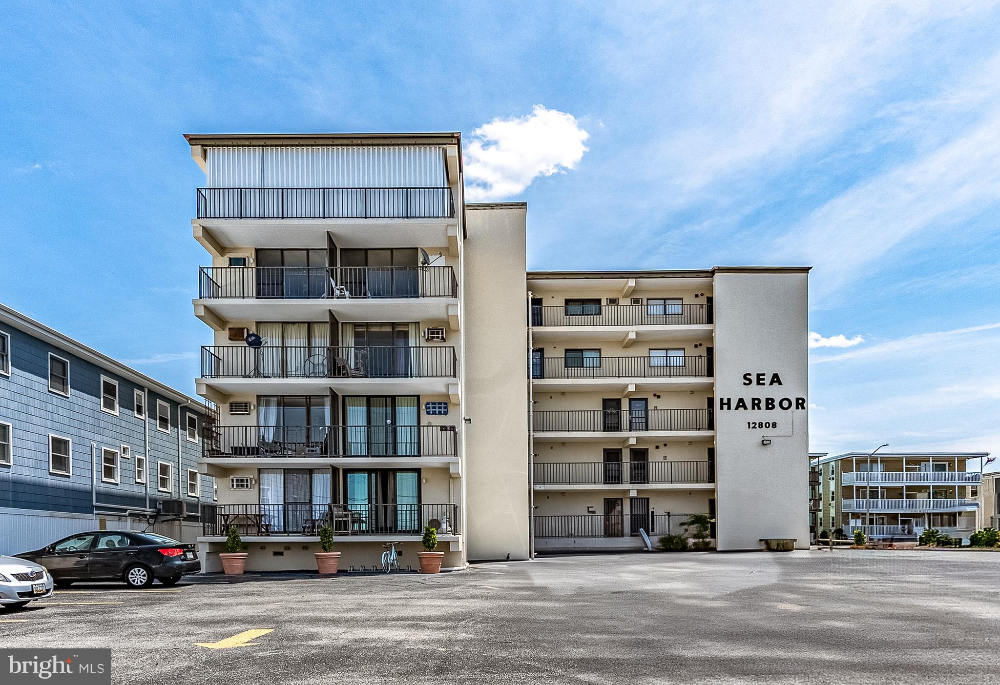 Beachside Charm at Sea Harbor! This bright and inviting end-unit efficiency offers everything you need for a beach getaway or investment. The updated bathroom (2022) features a newer shower surround, dual sinks, fresh fixtures, a newer toilet. Enjoy year-round comfort with a newer air conditioner (2022), water heater (2022), and the added value of a newer sliding glass door (2024). Plantation shutters add a stylish touch throughout. Building offers an elevator, a private storage locker, and bicycle storage. Located just a short distance to the beach in an ocean block building, you’ll also love being close to Northside Park, restaurants, and shopping. Move right in and start enjoying the best of North Ocean City!