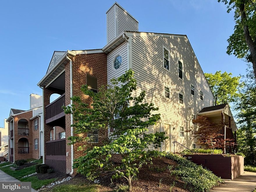 Beautiful 2 bedroom/2 bath condo featuring over 1100 square feet in the Rollingwood community, just mins to Old Town Manassas and walking distance to the Prince William Medical Center!  This end-unit ground level property features privacy, no stairs, and lots of community green space and gardens for your enjoyment!  This home features LVP flooring, an updated kitchen w/ white cabinets and newer appliances, refreshed bathrooms, a large living room w/ cozy fireplace, separate dining room, in-unit washer/dryer, huge storage room behind the living room, and a private covered balcony that overlooks trees and more green space.  Assigned parking and just mins to the VRE make this a commuters dream!