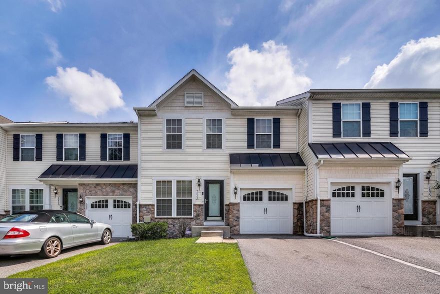 This gorgeous and spacious townhome awaits your arrival. The main level has an open concept with a large living area, dining room, kitchen and additional breakfast or sun room. Enjoy sitting out on the deck from the main level, complete with stairs to the backyard. The upstairs bedrooms are spacious with lots of closet space! The basement is fully finished with a large recreation room, a separate "room" and another storage area. The hardwood floors have been sanded and polished, carpets deep cleaned(This Saturday!), touch up paint throughout and new dryer! This home is very well maintained and clean!  No pets and good credit required.