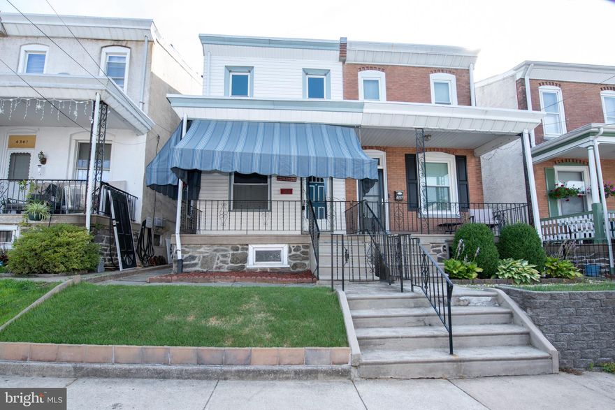 Discover the allure of your spacious porch front twin home in the heart of the historical neighborhood of Roxborough! Upon entering, you'll appreciate the fluidity of hardwood flooring that spans the entire first floor. The main level features a generous living room perfect for entertaining, a dining room for family gatherings, an eat-in kitchen equipped with stainless steel appliances & gray cabinetry,  along with access to a back staircase leading to the second floor. Additionally, the first floor boasts a convenient laundry room adjacent to a half bathroom. When leaving the laundry room, you'll be greeted by a well-manicured yard, complete with a patio deck and a swath of greenery that provides the option for a pool installation and ample space for gardening. The upper levels features three spacious bedrooms, a beautiful full bathroom, with another staircase leading to an added 4th bedroom with a large storage closet. This home also has a full  basement with endless possibilities, allowing you to transform it into the perfect space for your needs. Don't miss the chance to own this remarkable home. Schedule your showing today!