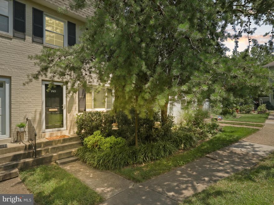 Welcome to 1745 N Cliff Street, a beautifully maintained 2-bedroom, 2-bathroom townhouse located in the desirable Cliff Gardens community of Del Ray. This inviting home offers three levels of light-filled living just steps from the charm and energy of Mount Vernon Avenue. The main level features an open and airy layout with a spacious living room that flows into the dining area and a fully remodeled kitchen, thoughtfully updated in 2020 with modern finishes, stylish cabinetry, quartz countertops and stainless appliances. It’s a perfect space for both everyday cooking and casual entertaining. From the main level, step out onto your private patio, ideal for outdoor dining, relaxing, or hosting friends. Upstairs, you'll find two bright, and generously sized bedrooms along with a full bath. The finished lower level offers a versatile space with a recreation room, second full bathroom, and additional storage. Residents of Cliff Gardens enjoy the use of a beautifully maintained shared courtyard, offering green space and a sense of community right outside your front door. Just one block from Mount Vernon Avenue, this home places you within a short distance of Del Ray’s most beloved spots including Matt & Tony’s, Junction Bakery, and the monthly Del Ray Flea Market. You're also just a few blocks from everyday conveniences like Walgreens, Aldi, and the YMCA. A pleasant stroll north on "The Avenue" leads to the bustling Saturday Del Ray Farmers Market, the historic St. Elmo’s Coffee Pub and an array of locally owned restaurants and boutiques that make this neighborhood so vibrant and unique. After a day enjoying Del Ray or a quick trip to nearby Old Town or National Landing, you’ll love unwinding with beautiful views from your extra-wide living room window, overlooking the expansive courtyard. Commuting is a breeze with the home just one mile from the Braddock Road Metro station, a short drive to Reagan National Airport, and easy access to Old Town, National Landing, and downtown D.C. 1 assigned parking spot conveys as well as 2 visitor parking tags and ample off street parking. This home offers the perfect blend of comfort, character, and location in one of Alexandria’s most beloved neighborhoods.