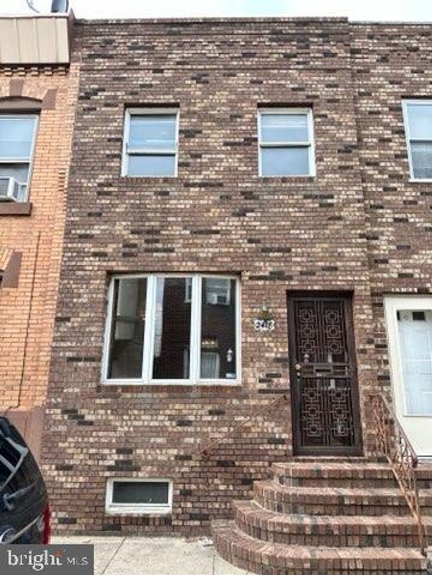 2418 South Jessup Street presents an opportunity to flip a solid property on a great block in Lower Moyamensing. Behind the brick facade, the first floor offers a living room with a bay window, a separate dining room, and a spacious kitchen with sliding glass doors to a private patio. The upper floor has two bedrooms and a spacious hall bathroom with a full window. The unfinished basement provides great room for storage. The property has been cleaned out, all utilities are on, and the systems, fixtures, and appliances are functional. Ready for work to begin!